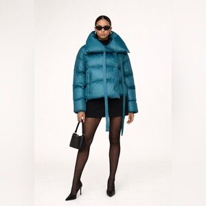 Bacon teal colored down filled puffer jacket. Size large.